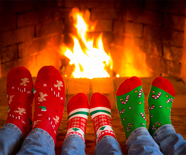Christmas socks by natural gas fireplace